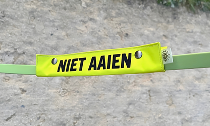 Waarschuwingslabel voor hondenriem